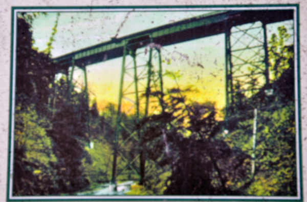 photo of A 1904 postcard showing the original Railroad bridge 